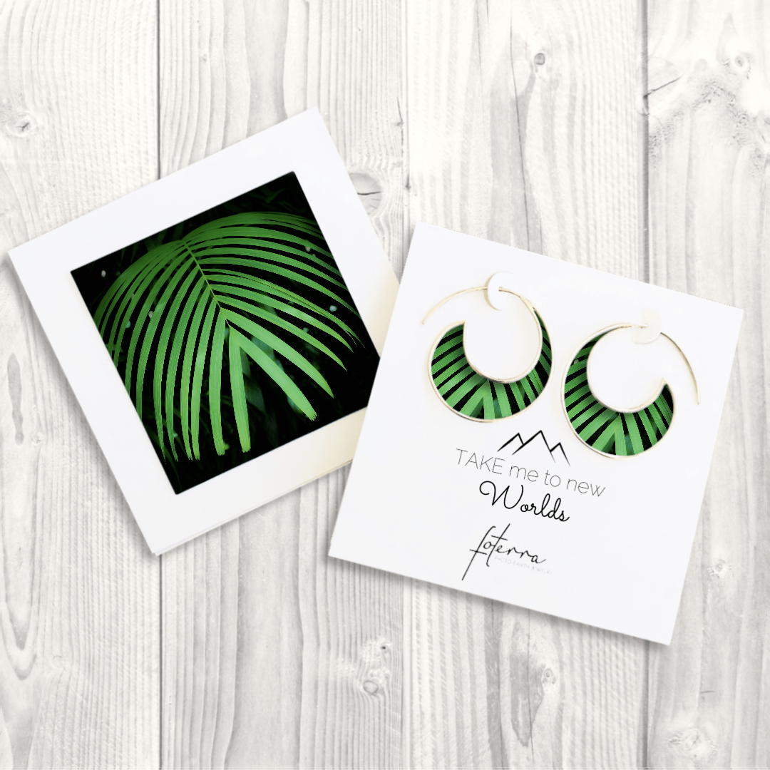 hoop earrings featuring photo of a palm leaf in green and black by Kelly Rice